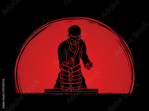 Karate man breaking bricks designed on sunrise background graphic vector.