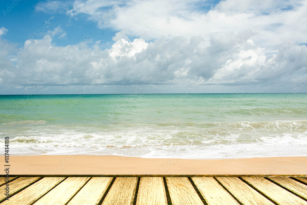 Fototapeta premium wood deck in front of sea landscape. ready for product display. textured image