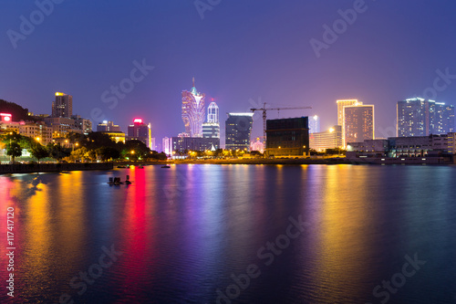 Macau cityscape at night © leungchopan