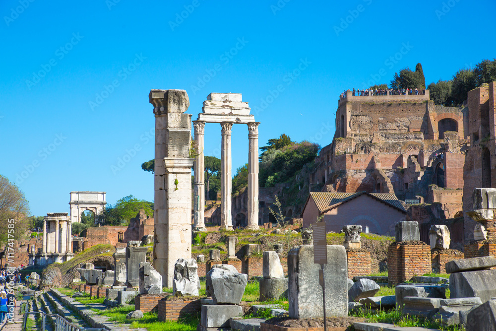 ROME, ITALY - APRIL 8, 2016: Ruins and Columns the Temple of Castor and Pollux Roman's forum with ruins of important ancient government buildings started 7th century BC