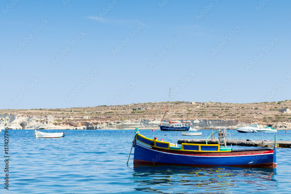 Traditional Maltese fishing boat, St Thomas Bay, Marsascala, Mal Traditional Maltese fishing boat, St Thomas Bay, Marsascala, Mal