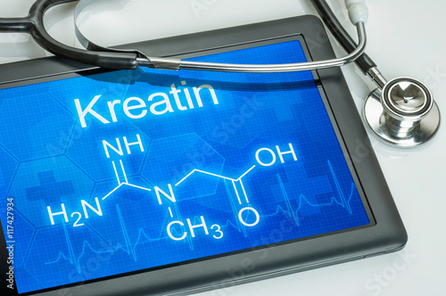 Tablet mit der chemischen Strukturformel von Kreatin