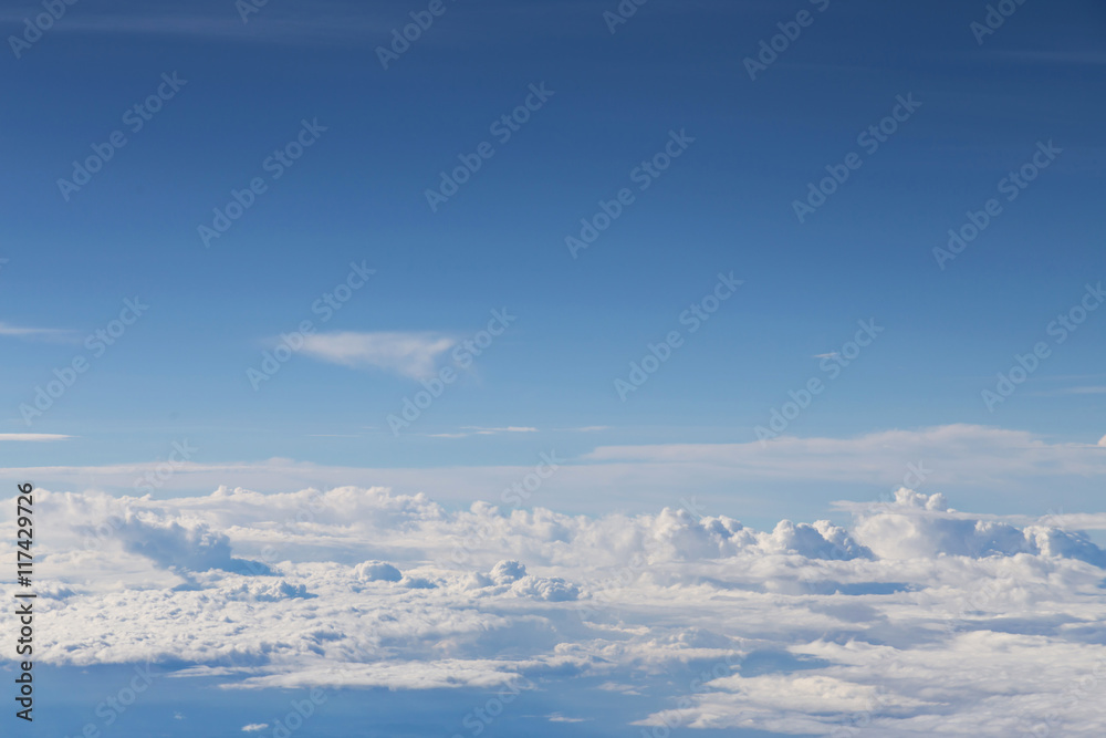 blue sky and white cloud view from the window of an airplane