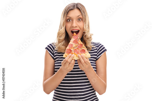 Woman having a slice of pizza