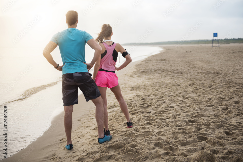 Looking at their jogging destination Looking at their jogging destination