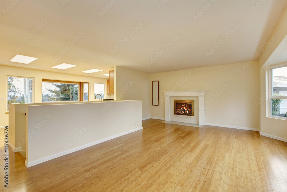Fototapeta premium Empty living room interior with polished hardwood floor.
