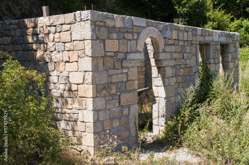 Old rural stone house in Galicnik village, Macedonia photo