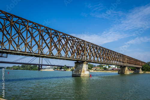 old railroad bridge across the Sava River © cokinaci