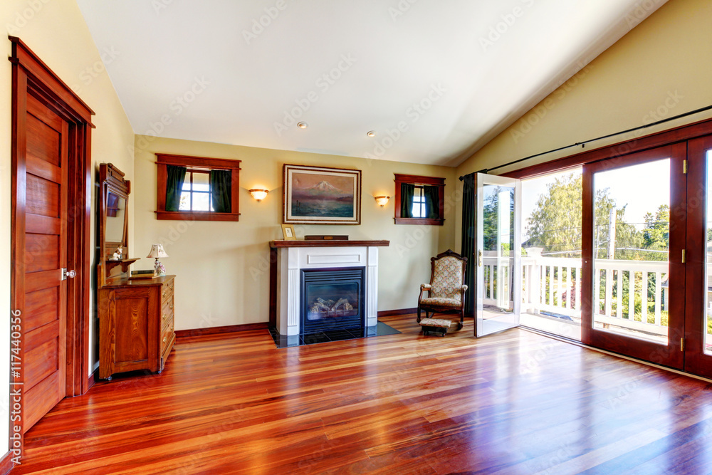 Fototapeta premium Room with beautiful chery hardwood floor and fireplace