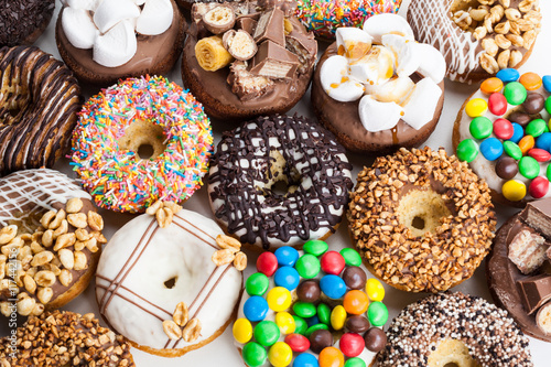 Close up of a selection of colorful donuts.