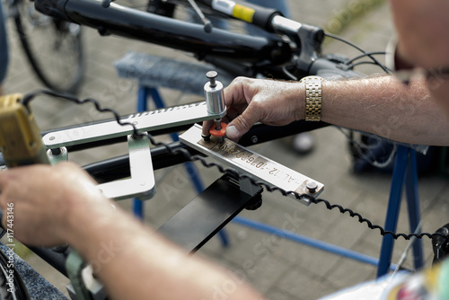 Master engraver, works with a copper plate on the street