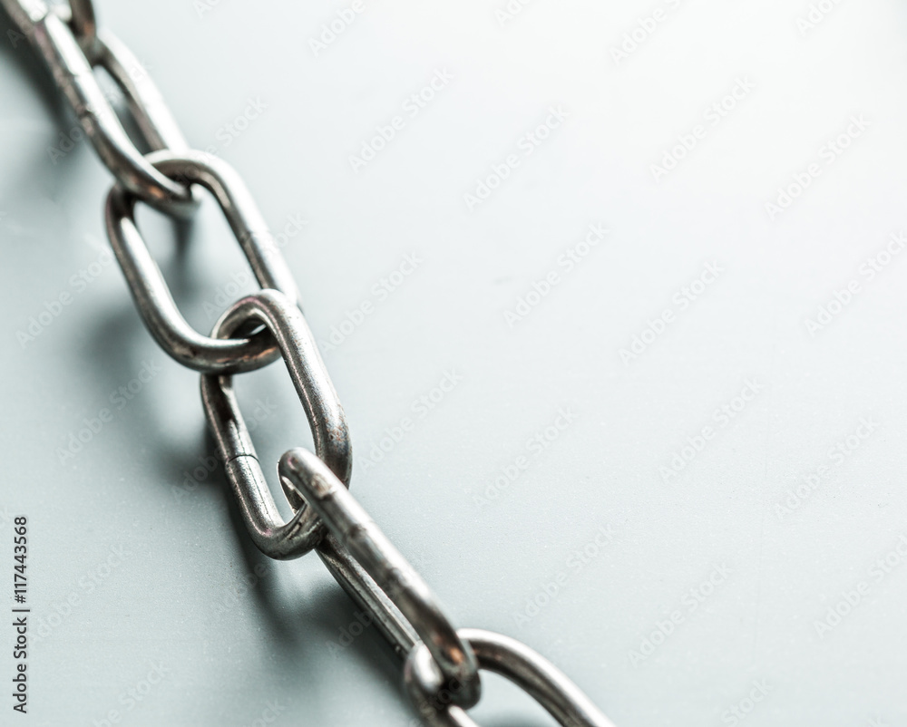 Obraz premium close up of metal chain part on white background