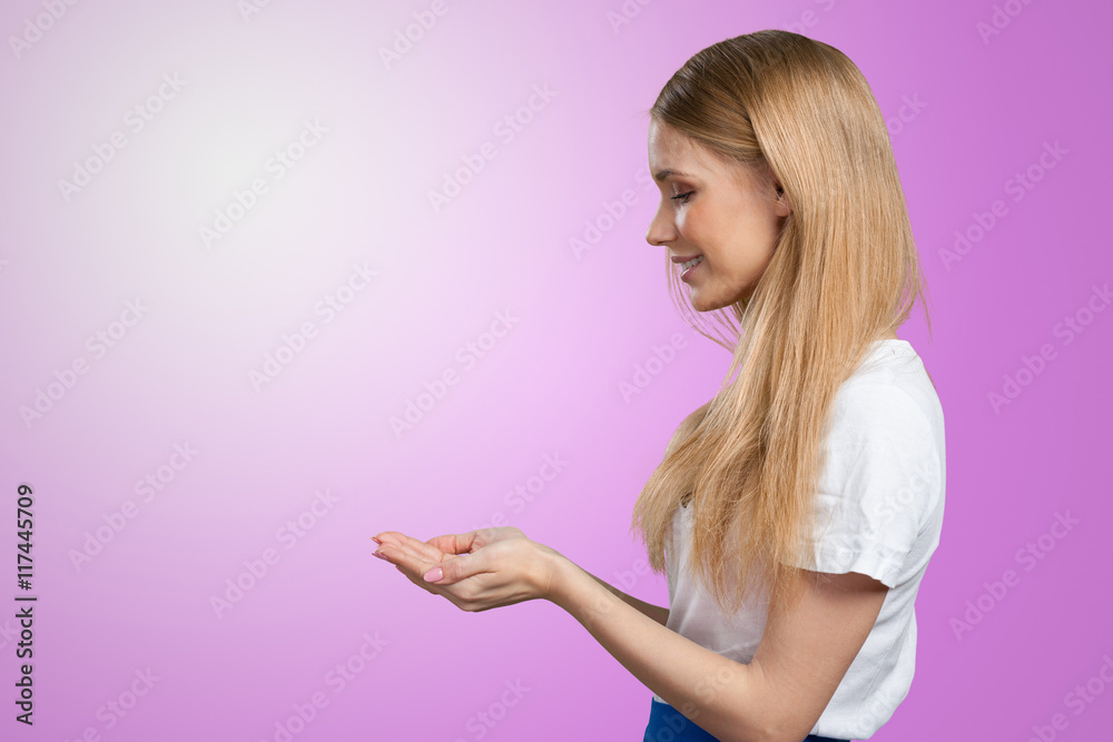 smiling young woman pointing smiling young woman pointing