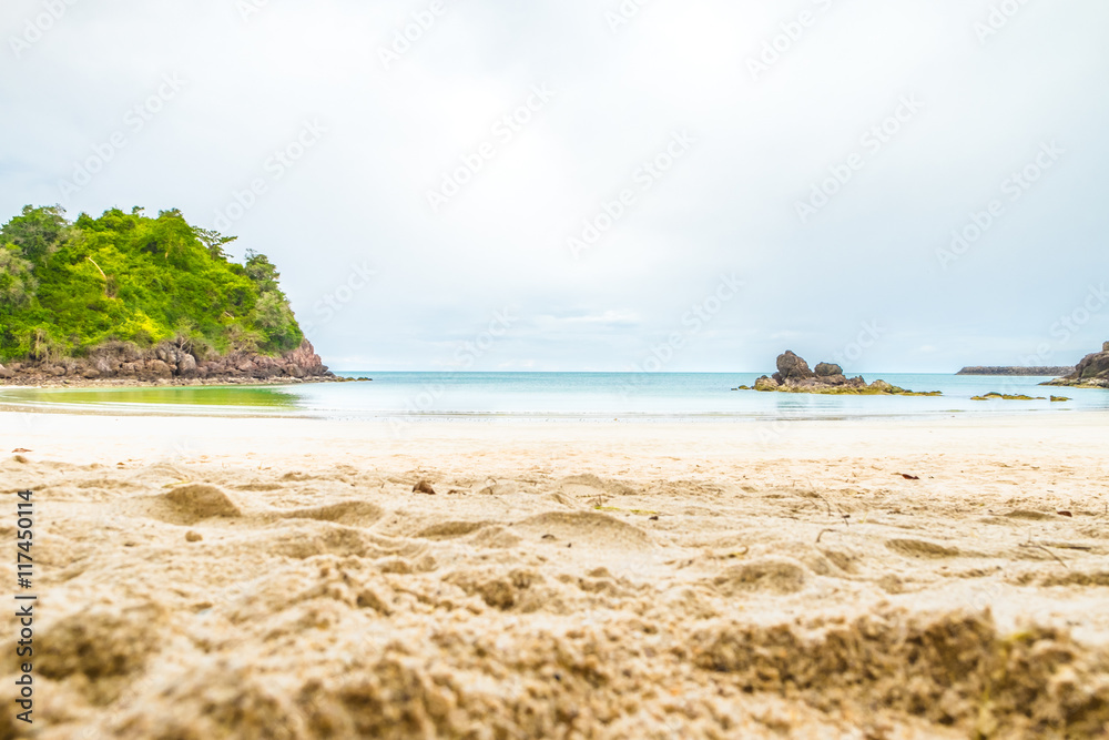 Beach sand and sea with rock,Landscape view of sea,Summer Concep