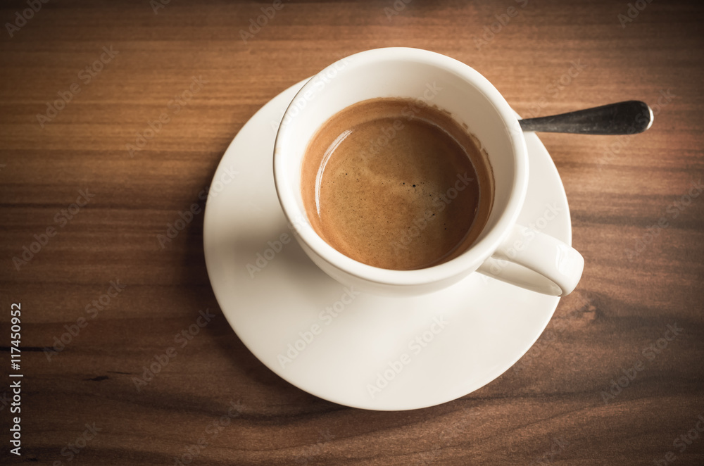 Freshly brewed espresso coffee in cup Freshly brewed espresso coffee in cup
