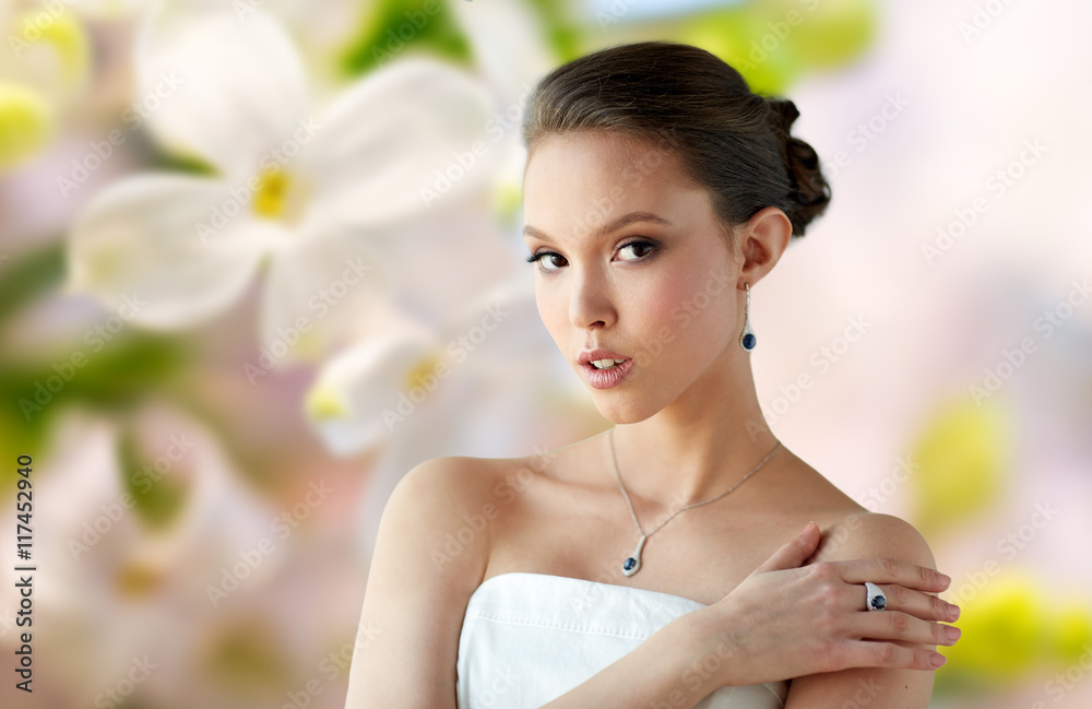 beautiful woman with earring, ring and pendant beautiful woman with earring, ring and pendant