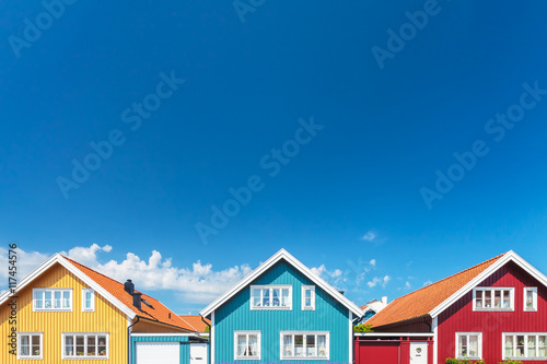 Old swedish houses in front of a blue sky