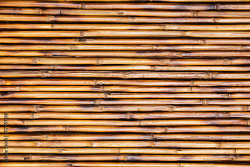 Brown bamboo fence for background and texture