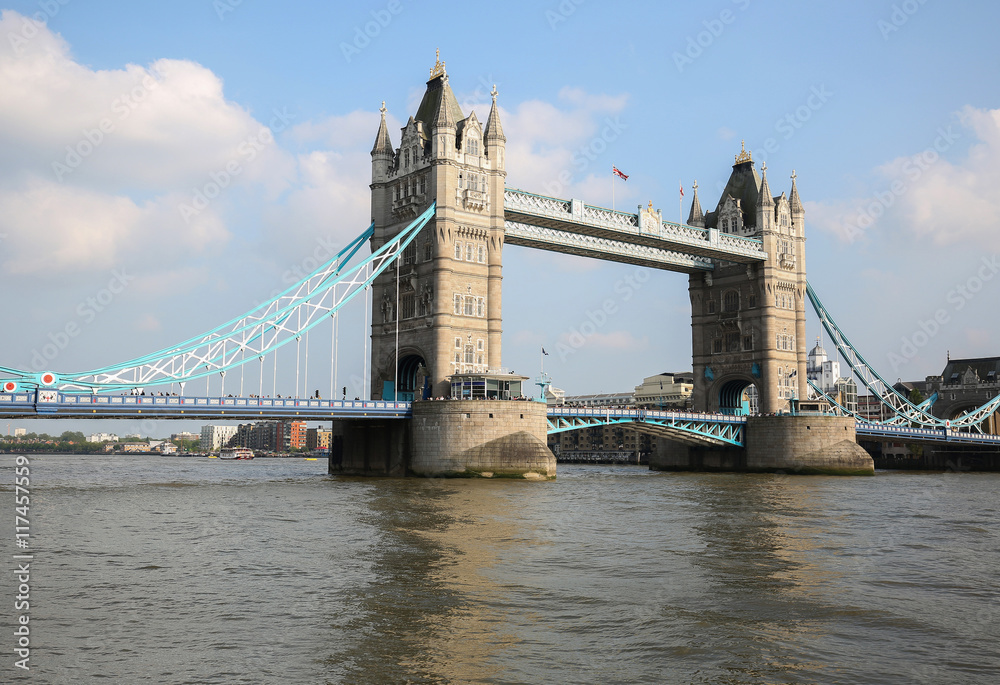 Beautiful Tower Bridge in London with the Union Jack flag blowing on the bridge