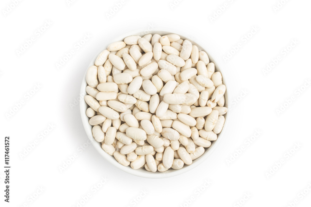White beans into a bowl in white background. Phaseolus vulgaris White beans into a bowl in white background. Phaseolus vulgaris