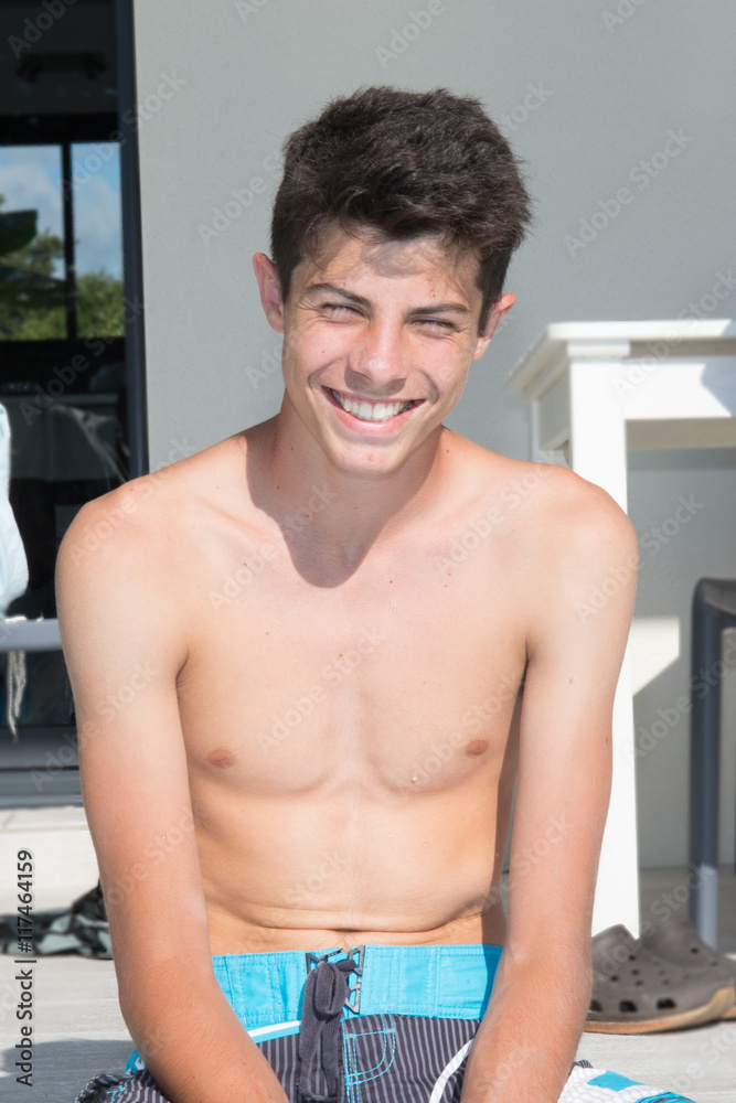 Portrait of handsome young man in swimming pool Portrait of handsome young man in swimming pool