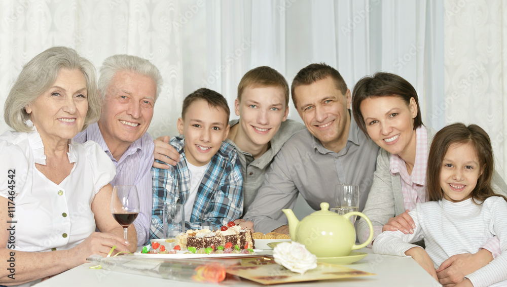 Happy family with cake Happy family with cake
