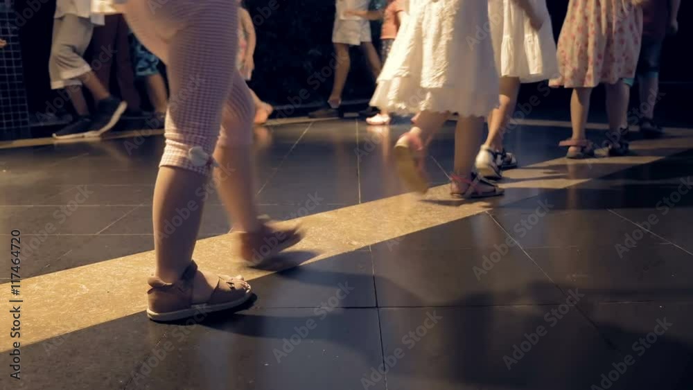 Children are walking in a huge circle on the dance floor. Families are having a great time. Kids are able to find a fun activity in any sport. Children are walking in a huge circle on the dance floor. Families are having a great time. Kids are able to find a fun activity in any sport.