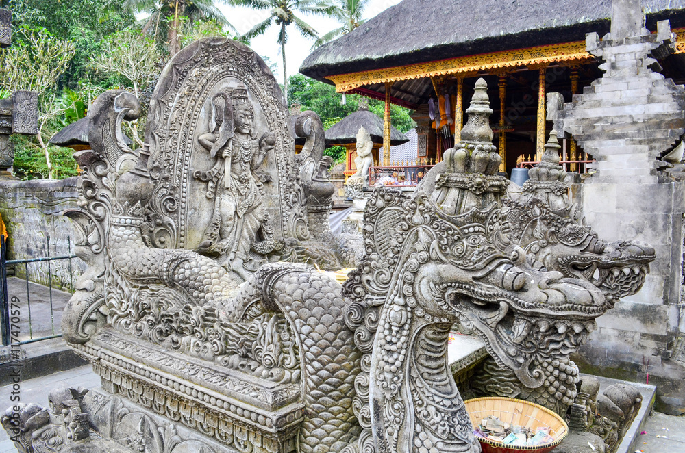 Stone-Carved Guardian Sculptures at Tirta Empul Temple in Bali