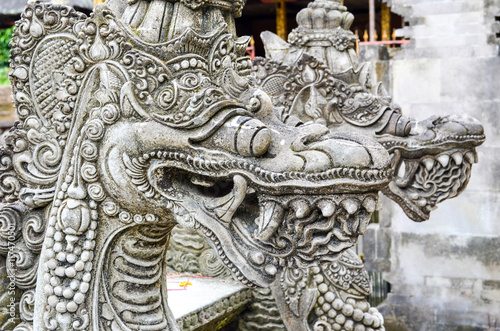 Close-Up of the Guardian Sculpture at Tirta Empul Temple in Bali