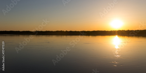 a beautiful sunset on the river