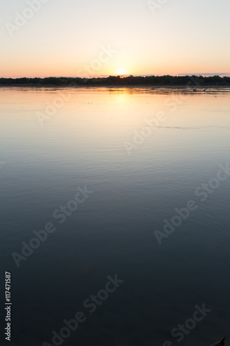 a beautiful sunset on the river