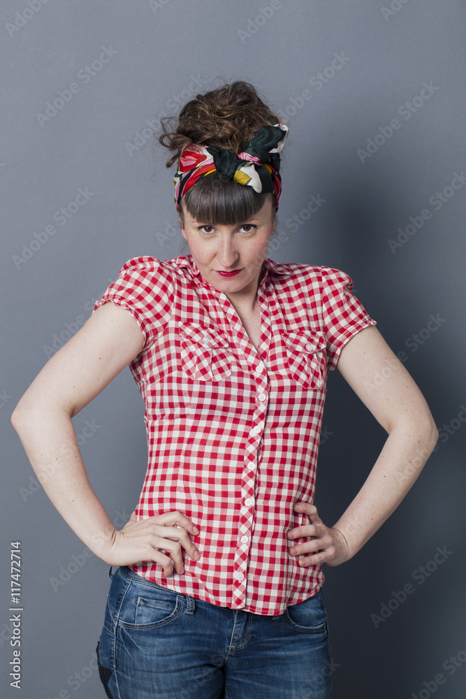sexy woman using male body language with hands on hips Stock Photo