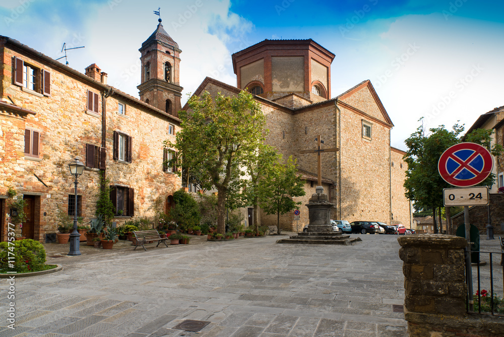 Church square in Lucignano with the collegiate church of St. Michael