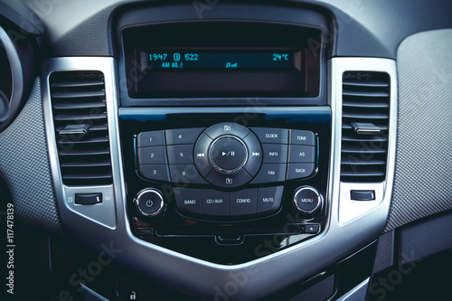 Car dashboard. Radio closeup. Modern CD player