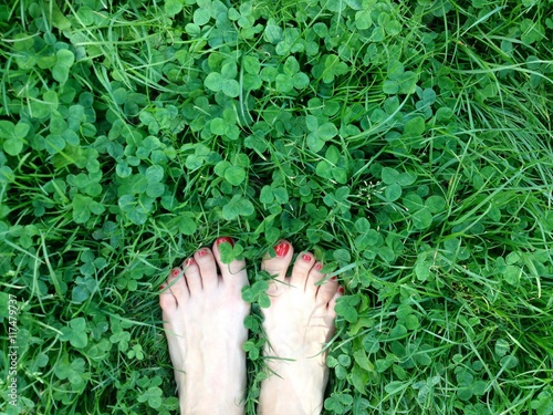 Barefoot on a fresh and juicy grass