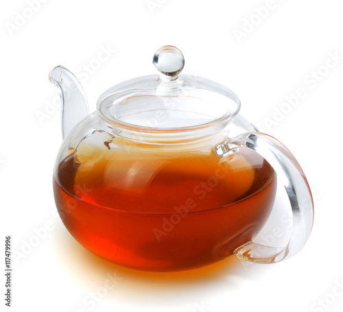 Teapot glass with black tea isolated on a white background with clipping path. Front view.