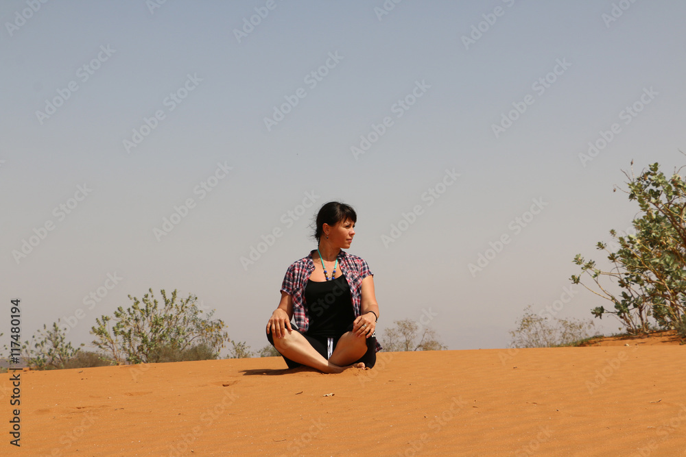 Tourist is in the desert in a summer day