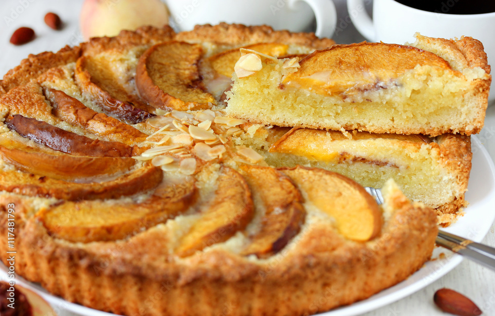 Cake with peaches and almonds. Delicious homemade cakes