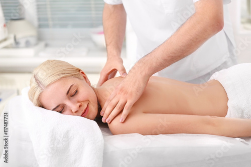 Young woman getting back ma...