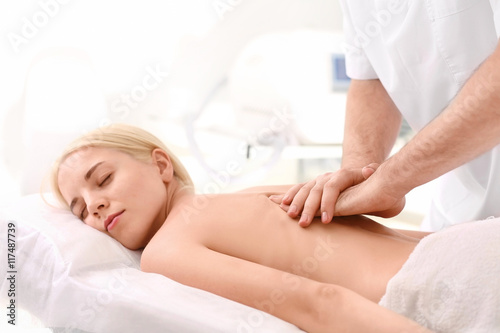 Young woman getting back ma...