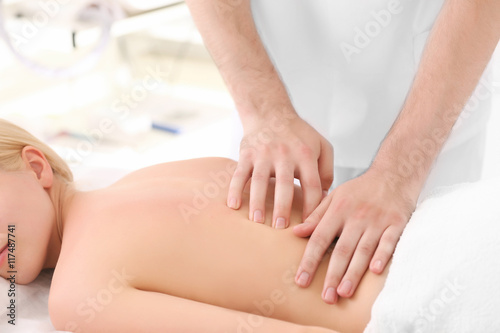 Young woman getting back ma...