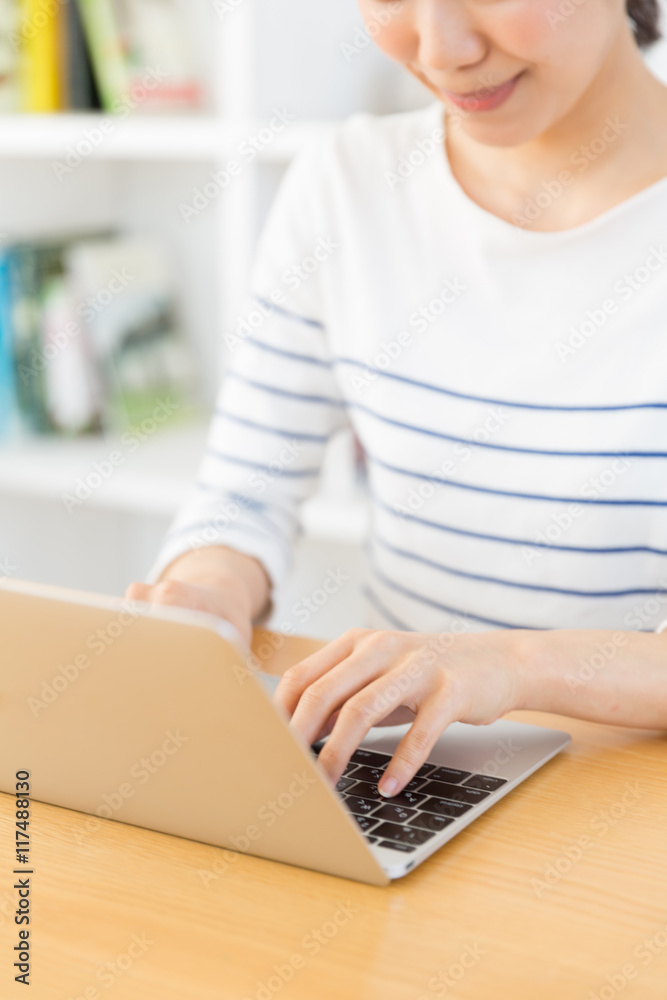 Fototapeta premium young asian woman relaxing in living room