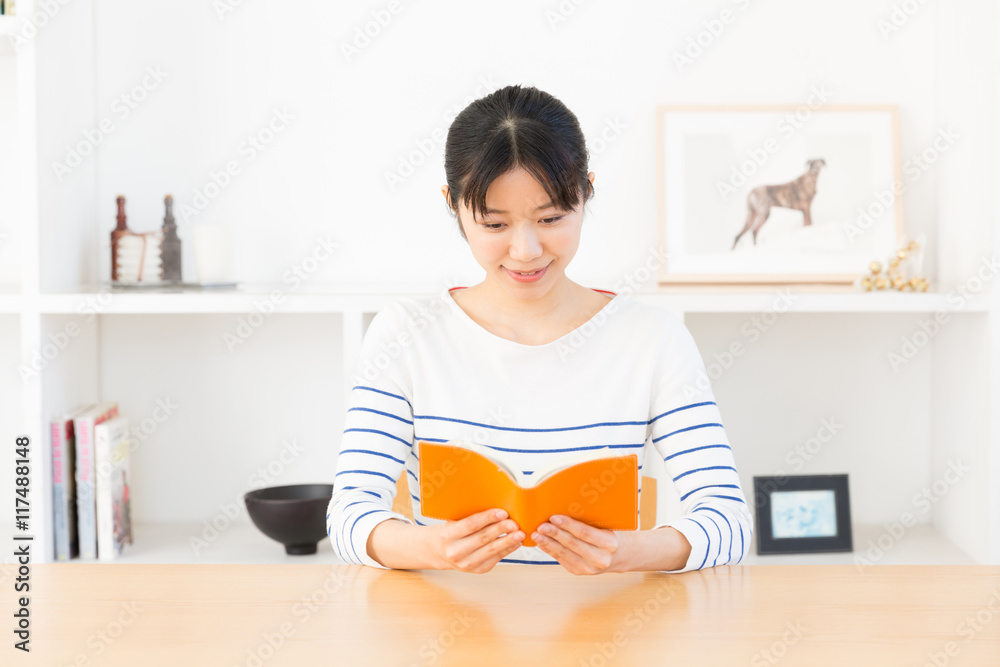 young asian woman relaxing in living room young asian woman relaxing in living room