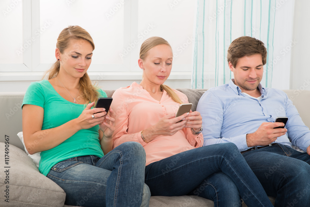 Group Of People Using Mobile Phone Group Of People Using Mobile Phone
