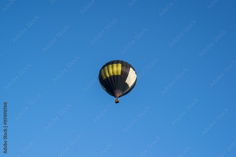 One air balloon fly in the blue sky, aerostate One air balloon fly in the blue sky, aerostate