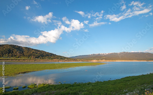 Snake River under cumulus cloud sky in Alpine Wyoming United States