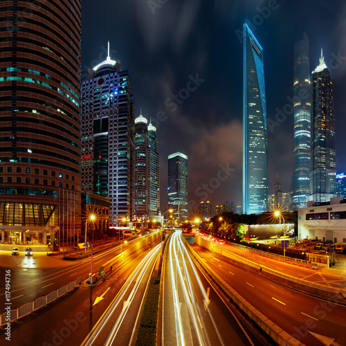 Light trails on the modern building background in Shanghai, China