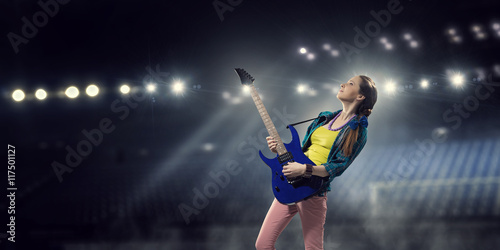 Female rock guitarist . Mixed media