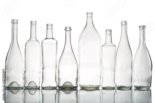 Empty bottles isolated over the white background