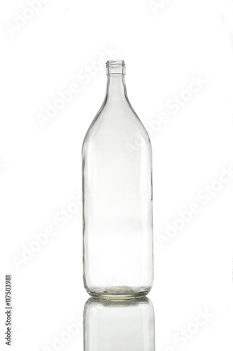 Empty bottle isolated over the white background